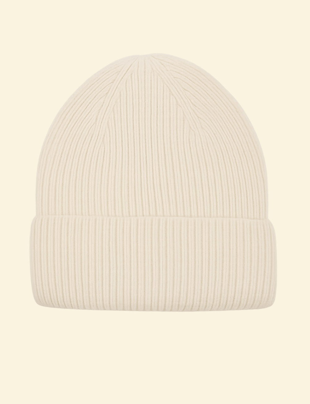 A cream-colored ribbed knit beanie made from a cozy cashmere-wool blend, displayed on a neutral background.