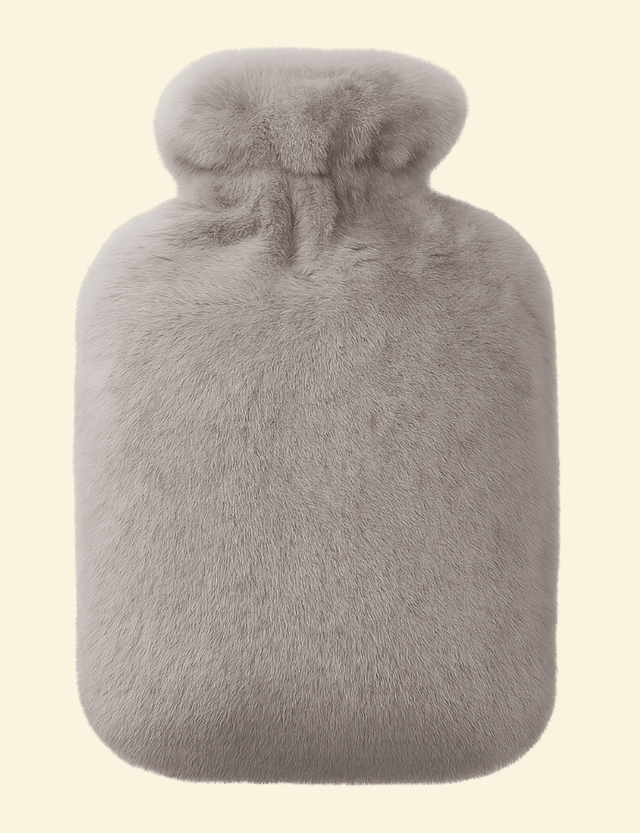 Grey Warmweave™ hot water bottle in plush flannel cover, designed for leak-resistant, long-lasting warmth.