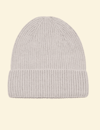 A soft, ribbed light grey knit beanie made from a premium cashmere-wool blend, displayed on a transparent background.