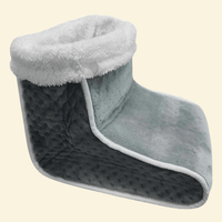 Grey Warmweave™ plug-in foot warmer with ultra-soft velvet lining and cream faux fur trim, displayed on cream background.