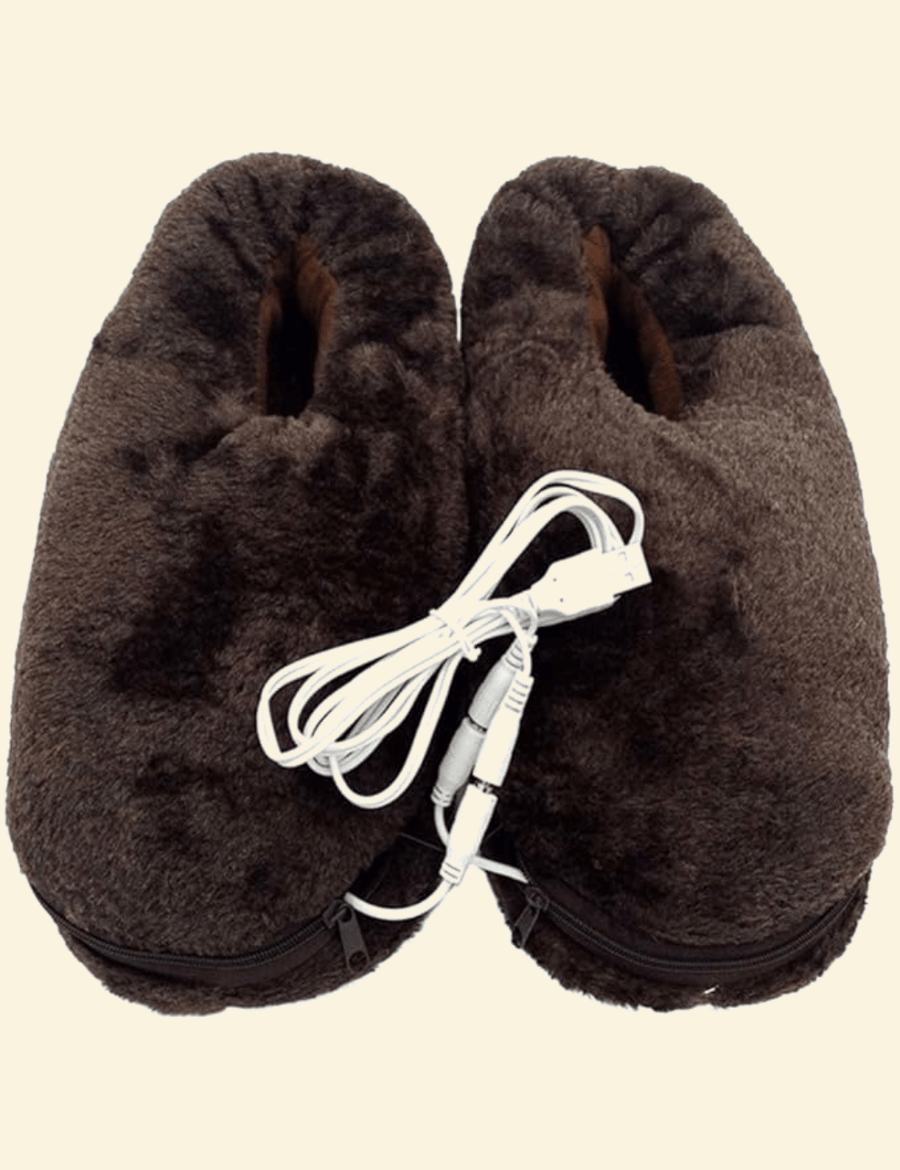 Close-up of Warmweave™ USB Heated Slippers in brown, featuring a soft fleece exterior and USB charging cable at the center. Designed for warmth, comfort, and easy USB-powered heating.
