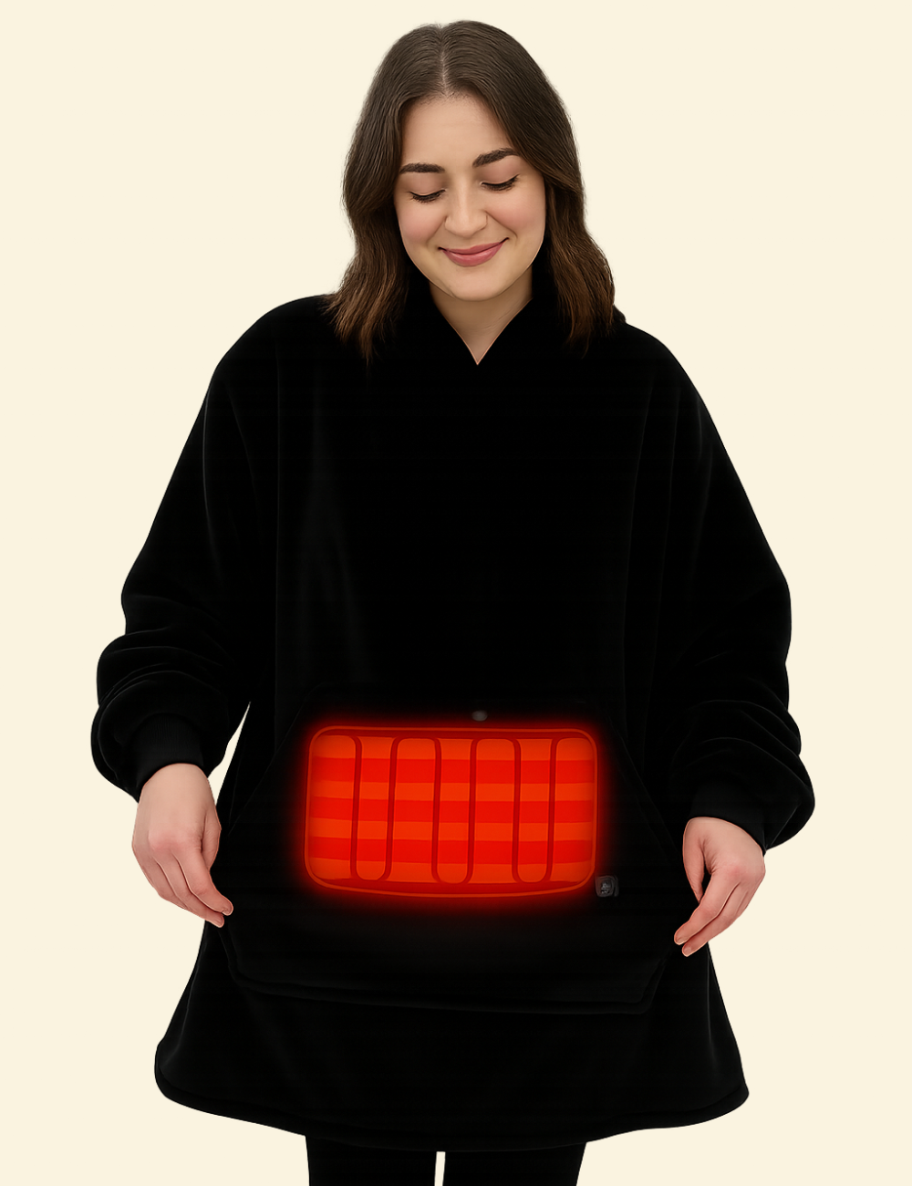 Woman showing glowing red belly heating zone on black oversized blanket
