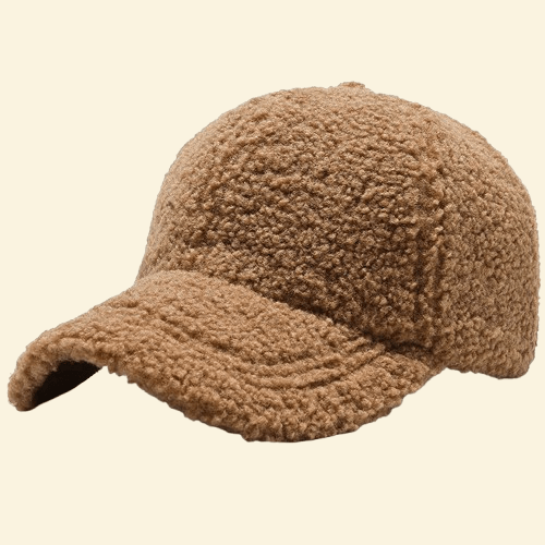 A wool-lined baseball cap in Toasted Chestnut brown, offering thick insulation and stylish cold-weather protection.

