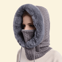 Soft grey faux fur scarf hood worn by model in cozy winter style