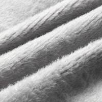 Close-up of textured fabric with a focus on pattern and texture.