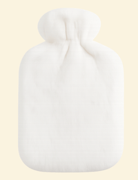 White Warmweave™ hot water bottle featuring a flannel exterior, blending comfort with minimalist style.