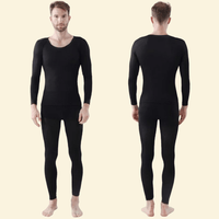 Man wearing Warmweave™ black thermal underwear set, front and back view

