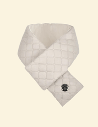 Front view of folded cream-colored USB heated scarf with power button and quilted stitching on neutral background